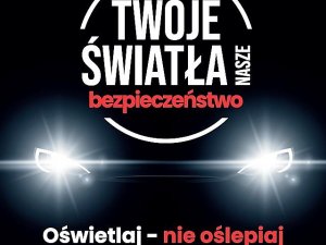 logo kampanii Twoje światła nasze bezpieczeństwo. przód pojazdu z włączonymi światłami mijania.