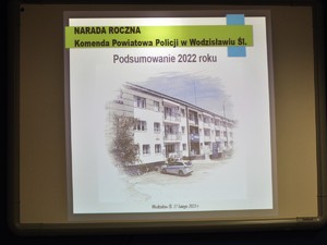 slajd wyświetlony na rzutniku, dotyczy prezentacji na naradę roczną podsumowującą rok 2022